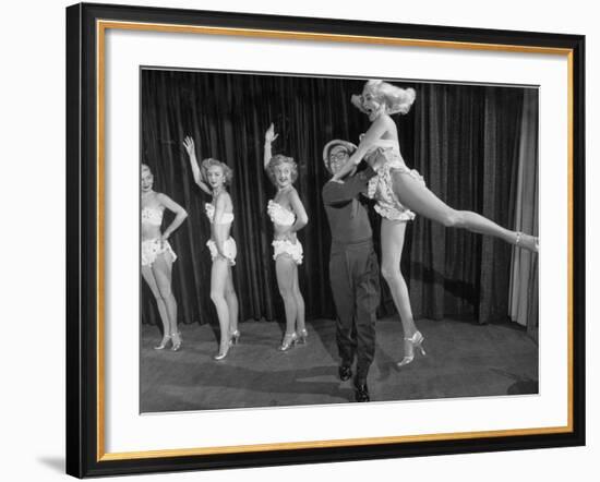 Actor Clowning around with Dancing Girls During the Nightlife in Las Vegas-Loomis Dean-Framed Premium Photographic Print