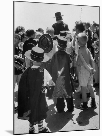 Actor Guy Williams as Zorro Signing Autographs for Fans at Disneyland-Allan Grant-Mounted Premium Photographic Print