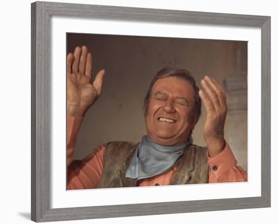 Actor John Wayne During Filming of Western Movie "The Undefeated"-John Dominis-Framed Premium Photographic Print