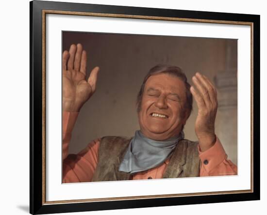 Actor John Wayne During Filming of Western Movie "The Undefeated"-John Dominis-Framed Premium Photographic Print