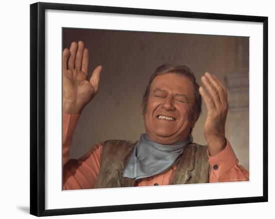 Actor John Wayne During Filming of Western Movie "The Undefeated"-John Dominis-Framed Premium Photographic Print