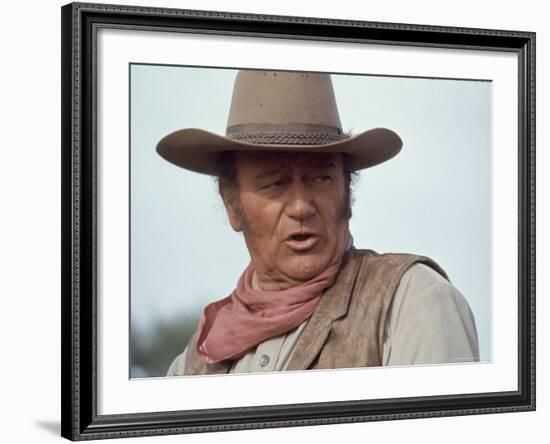 Actor John Wayne During Filming of Western Movie "The Undefeated"-John Dominis-Framed Premium Photographic Print