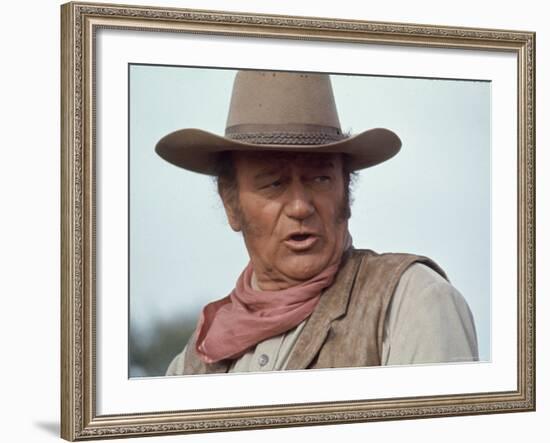 Actor John Wayne During Filming of Western Movie "The Undefeated"-John Dominis-Framed Premium Photographic Print