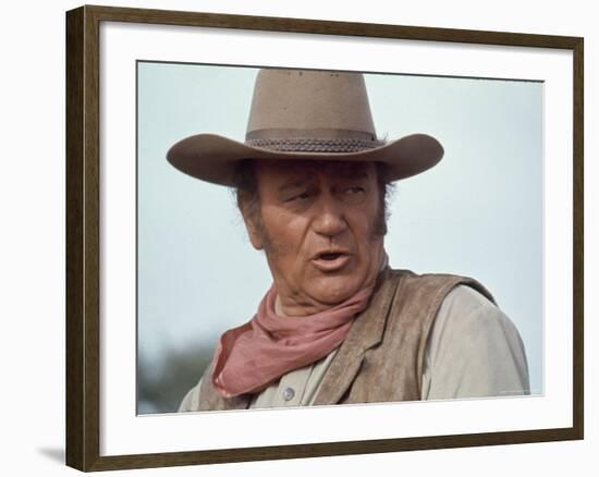 Actor John Wayne During Filming of Western Movie "The Undefeated"-John Dominis-Framed Premium Photographic Print