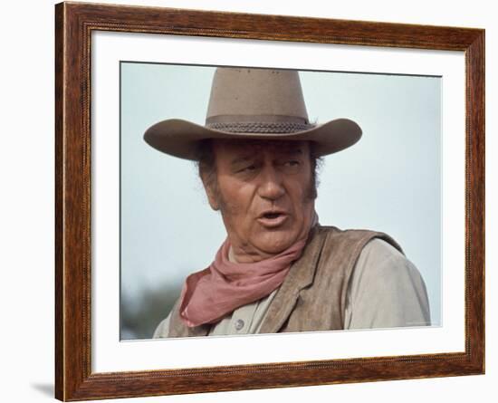 Actor John Wayne During Filming of Western Movie "The Undefeated"-John Dominis-Framed Premium Photographic Print