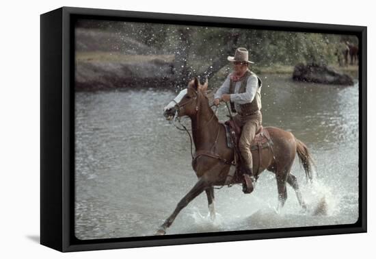 Actor John Wayne During Filming of Western Movie "The Undefeated"-John Dominis-Framed Premier Image Canvas