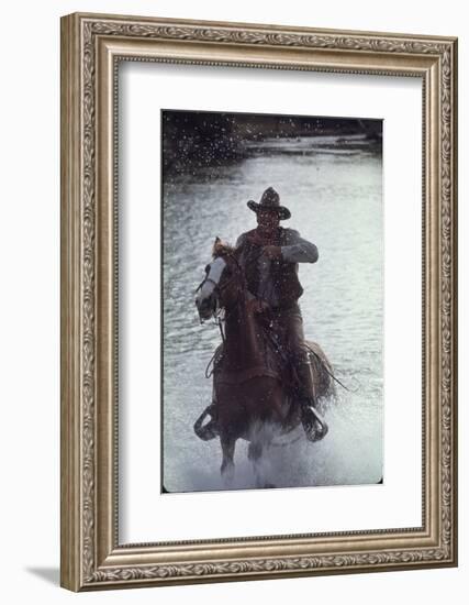 Actor John Wayne During Filming of Western Movie "The Undefeated"-John Dominis-Framed Photographic Print