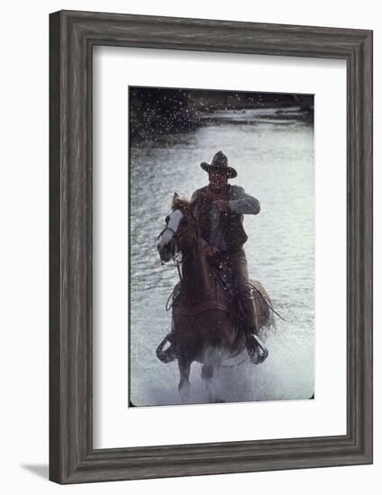 Actor John Wayne During Filming of Western Movie "The Undefeated"-John Dominis-Framed Photographic Print