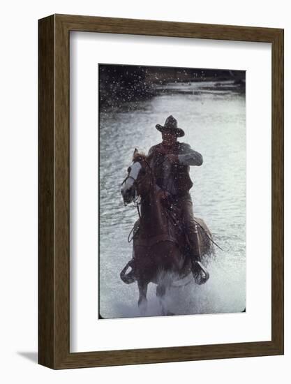 Actor John Wayne During Filming of Western Movie "The Undefeated"-John Dominis-Framed Photographic Print