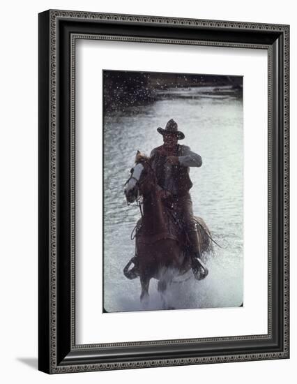 Actor John Wayne During Filming of Western Movie "The Undefeated"-John Dominis-Framed Photographic Print