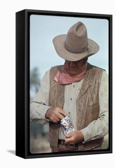 Actor John Wayne During Filming of Western Movie "The Undefeated"-John Dominis-Framed Premier Image Canvas