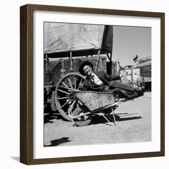 Actor Kirk Douglas Clowning on the Set of the Western Action Film "Gunfight at O.K. Corral"-Ralph Crane-Framed Premium Photographic Print
