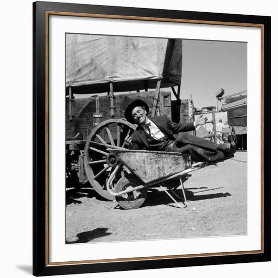 Actor Kirk Douglas Clowning on the Set of the Western Action Film "Gunfight at O.K. Corral"-Ralph Crane-Framed Premium Photographic Print