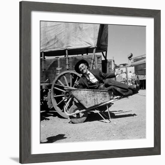 Actor Kirk Douglas Clowning on the Set of the Western Action Film "Gunfight at O.K. Corral"-Ralph Crane-Framed Premium Photographic Print