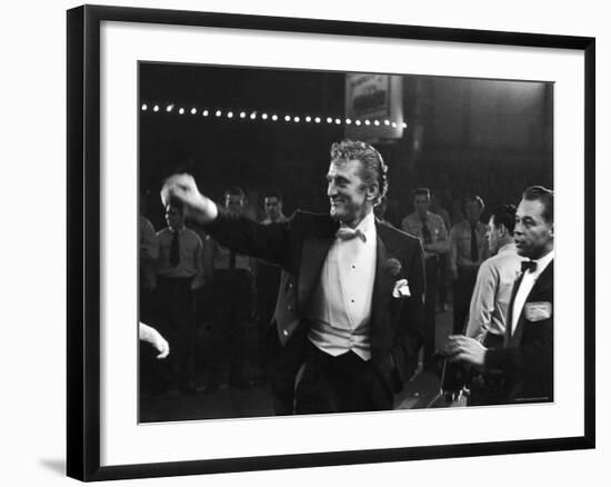 Actor Kirk Douglas, Smiling and Waving as He Enters RKO Pantages Theatre, For the Academy Awards-Ed Clark-Framed Premium Photographic Print