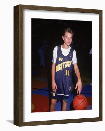 Actor Leonardo Dicaprio in Basketball Uniform-null-Framed Premium Photographic Print