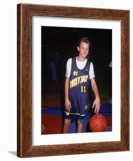 Actor Leonardo Dicaprio in Basketball Uniform-null-Framed Premium Photographic Print