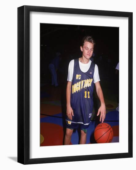 Actor Leonardo Dicaprio in Basketball Uniform-null-Framed Premium Photographic Print