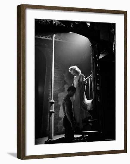 Actor Marlon Brando Kneeling before Actress Kim Hunter in Love Scene, A Streetcar Named Desire-Eliot Elisofon-Framed Premium Photographic Print