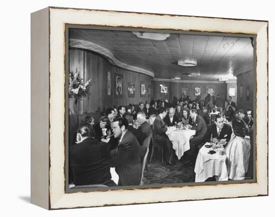 Actor Orson Welles at Table on Left with Cigar in His Mouth-Alfred Eisenstaedt-Framed Premier Image Canvas