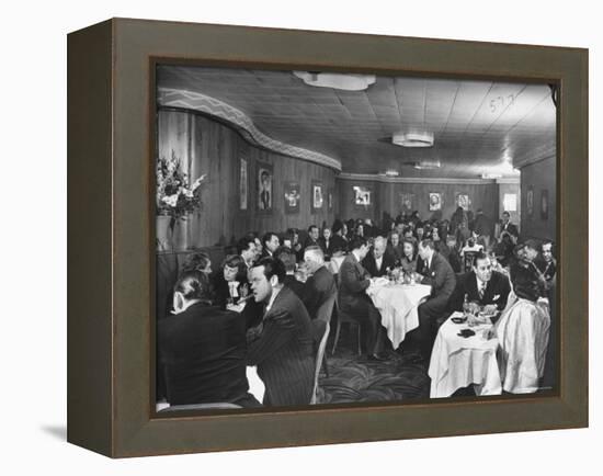 Actor Orson Welles at Table on Left with Cigar in His Mouth-Alfred Eisenstaedt-Framed Premier Image Canvas