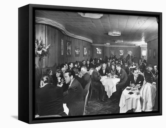 Actor Orson Welles at Table on Left with Cigar in His Mouth-Alfred Eisenstaedt-Framed Premier Image Canvas