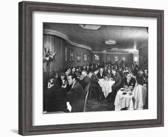 Actor Orson Welles at Table on Left with Cigar in His Mouth-Alfred Eisenstaedt-Framed Premium Photographic Print