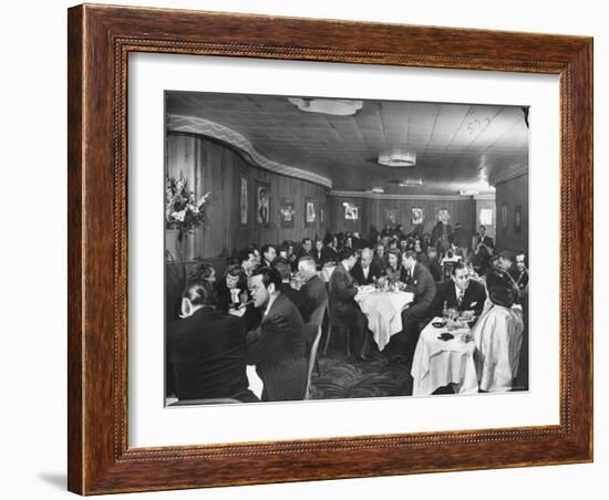 Actor Orson Welles at Table on Left with Cigar in His Mouth-Alfred Eisenstaedt-Framed Premium Photographic Print