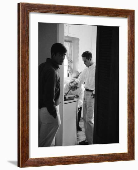 Actor Paul Newman Cooking Eggs for Guests Incl. Anthony Perkins During an Informal Party-null-Framed Premium Photographic Print