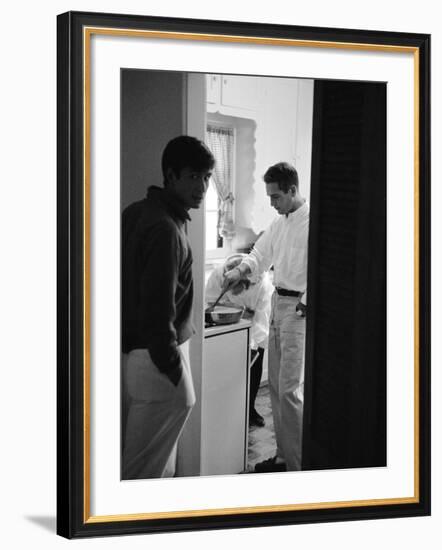 Actor Paul Newman Cooking Eggs for Guests Incl. Anthony Perkins During an Informal Party-null-Framed Premium Photographic Print