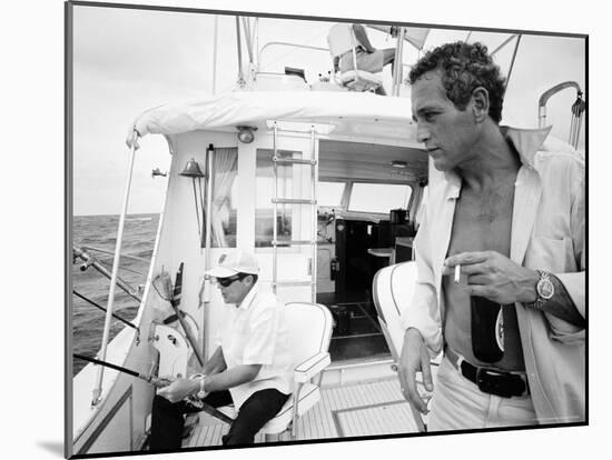 Actor Paul Newman Fishing with a Friend-Mark Kauffman-Mounted Premium Photographic Print