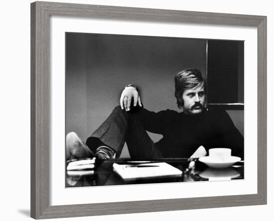 Actor Robert Redford Brooding While Conferring with His Agent-John Dominis-Framed Premium Photographic Print