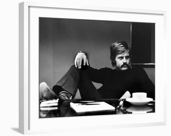 Actor Robert Redford Brooding While Conferring with His Agent-John Dominis-Framed Premium Photographic Print