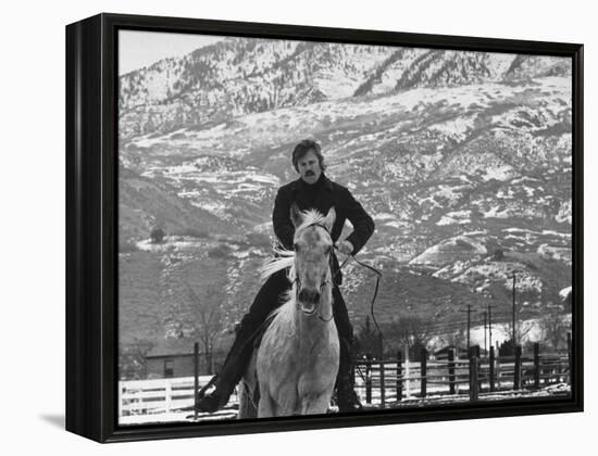 Actor Robert Redford Exercising One of His Eight Saddle Horses on His Remote Mountain Ranch-John Dominis-Framed Premier Image Canvas
