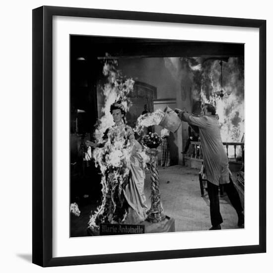 Actor Vincent Price Putting Out Fire in Film "House of Wax"-J^ R^ Eyerman-Framed Premium Photographic Print