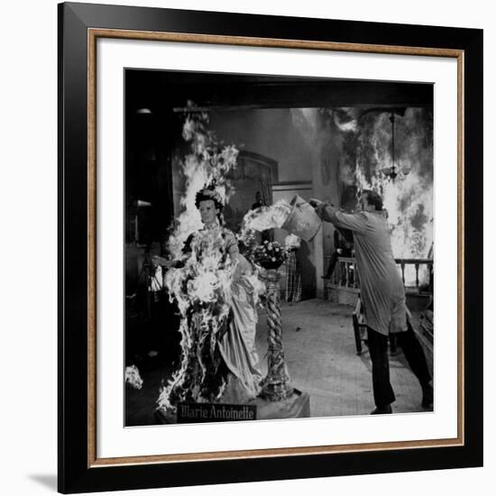 Actor Vincent Price Putting Out Fire in Film "House of Wax"-J^ R^ Eyerman-Framed Premium Photographic Print