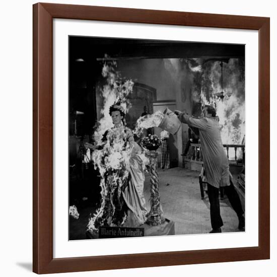 Actor Vincent Price Putting Out Fire in Film "House of Wax"-J^ R^ Eyerman-Framed Premium Photographic Print