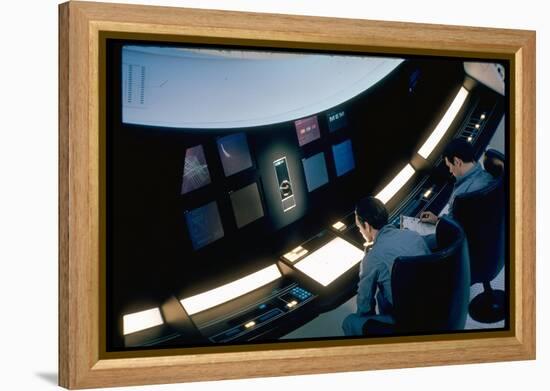 Actors Keir Dullea and Gray Lockwood Sitting at Console in Scene of "2001: A Space Odyssey"-Dmitri Kessel-Framed Premier Image Canvas