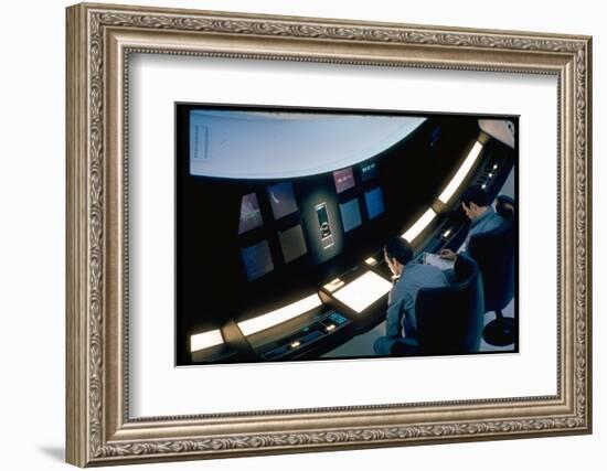 Actors Keir Dullea and Gray Lockwood Sitting at Console in Scene of "2001: A Space Odyssey"-Dmitri Kessel-Framed Photographic Print