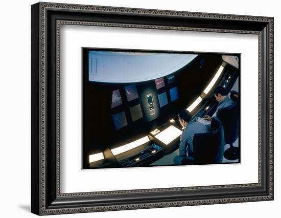 Actors Keir Dullea and Gray Lockwood Sitting at Console in Scene of "2001: A Space Odyssey"-Dmitri Kessel-Framed Photographic Print