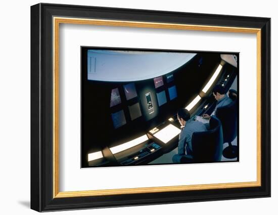 Actors Keir Dullea and Gray Lockwood Sitting at Console in Scene of "2001: A Space Odyssey"-Dmitri Kessel-Framed Photographic Print