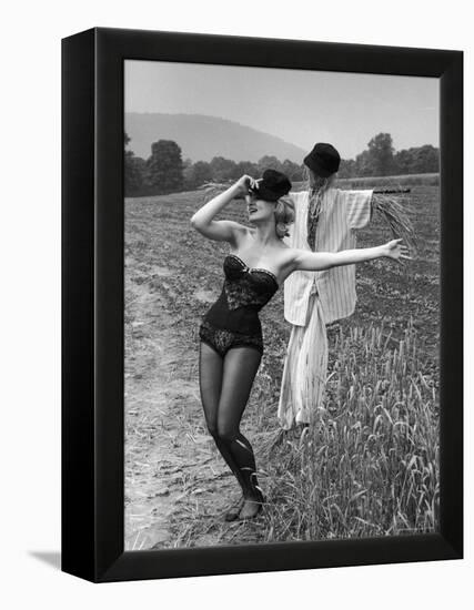 Actress and Dancer Julie Newmar Warming Up for Her Devil's Role in the Musical "Damn Yankees"-Nina Leen-Framed Premier Image Canvas