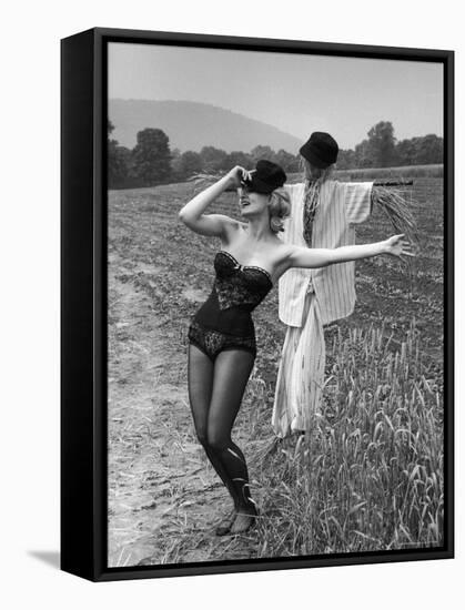 Actress and Dancer Julie Newmar Warming Up for Her Devil's Role in the Musical "Damn Yankees"-Nina Leen-Framed Premier Image Canvas