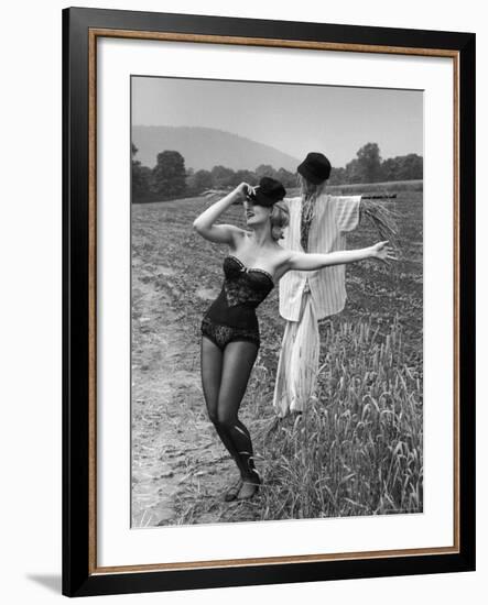 Actress and Dancer Julie Newmar Warming Up for Her Devil's Role in the Musical "Damn Yankees"-Nina Leen-Framed Premium Photographic Print