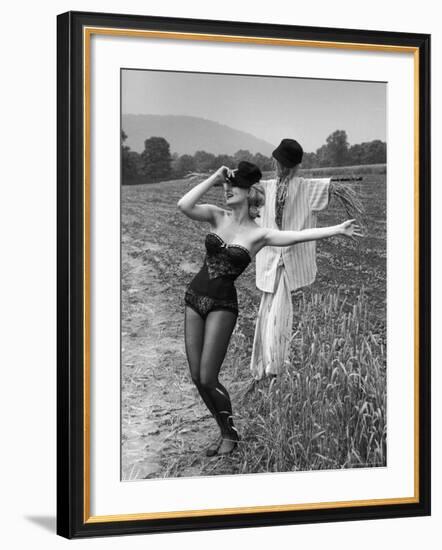 Actress and Dancer Julie Newmar Warming Up for Her Devil's Role in the Musical "Damn Yankees"-Nina Leen-Framed Premium Photographic Print