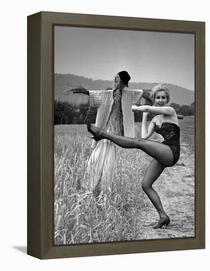 Actress and Dancer Julie Newmar Warming Up for Her Devil's Role in the Musical "Damn Yankees"-Nina Leen-Framed Premier Image Canvas