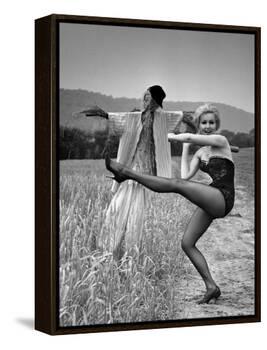 Actress and Dancer Julie Newmar Warming Up for Her Devil's Role in the Musical "Damn Yankees"-Nina Leen-Framed Premier Image Canvas