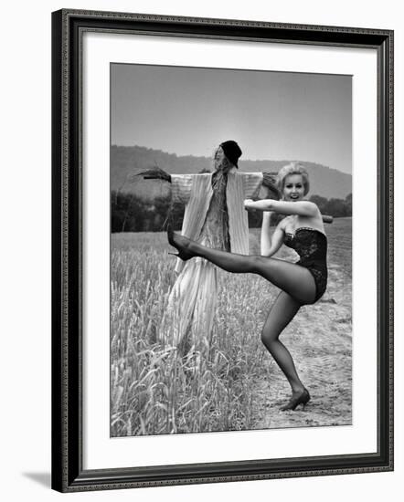 Actress and Dancer Julie Newmar Warming Up for Her Devil's Role in the Musical "Damn Yankees"-Nina Leen-Framed Premium Photographic Print