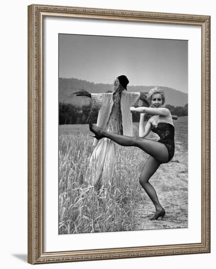 Actress and Dancer Julie Newmar Warming Up for Her Devil's Role in the Musical "Damn Yankees"-Nina Leen-Framed Premium Photographic Print