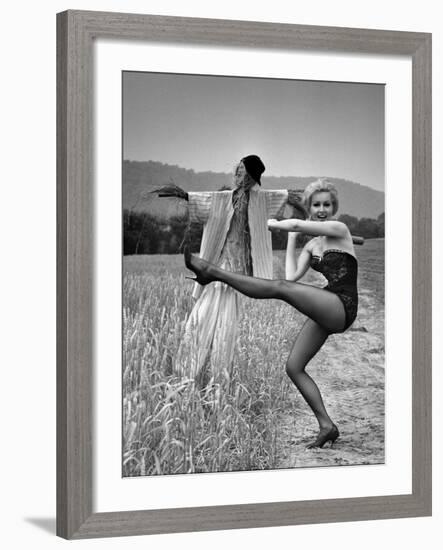 Actress and Dancer Julie Newmar Warming Up for Her Devil's Role in the Musical "Damn Yankees"-Nina Leen-Framed Premium Photographic Print